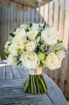 Hand tied bridal bouquet in whites and soft neutrals