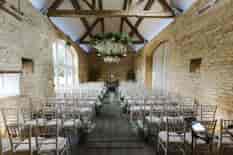 The stone barn all set for the wedding ceremony