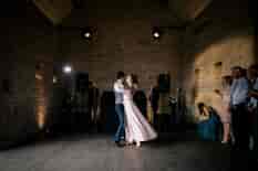Bride and groom dancing together for their first dance. Photography: Katie Hamilton Photography